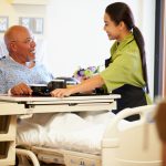 nurse caring for patient